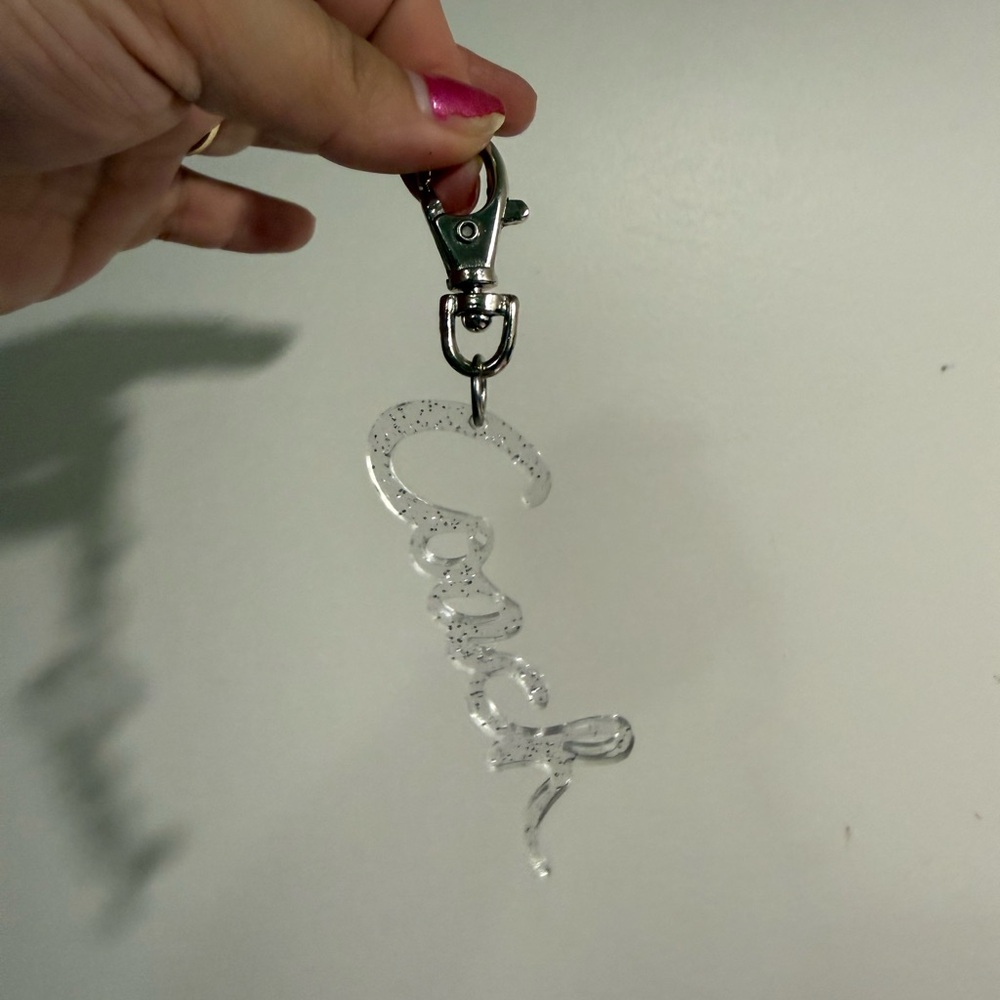 SOLD Coach clear glitter script hangtag charm poppy - Picture 2 of 3